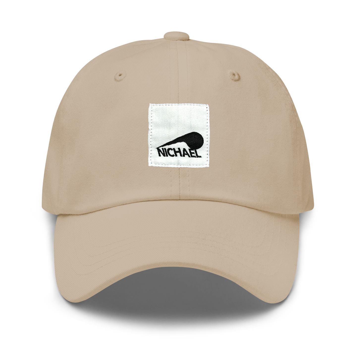The front of our Full Sploosh dad hat in tan sporting a black and white stitched Full Sploosh patch. This baseball cap is unstructured for a more relaxed fit.